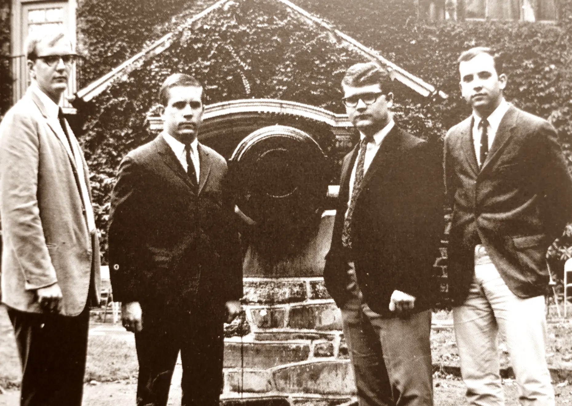 Historical photo of members around CDE cannon.